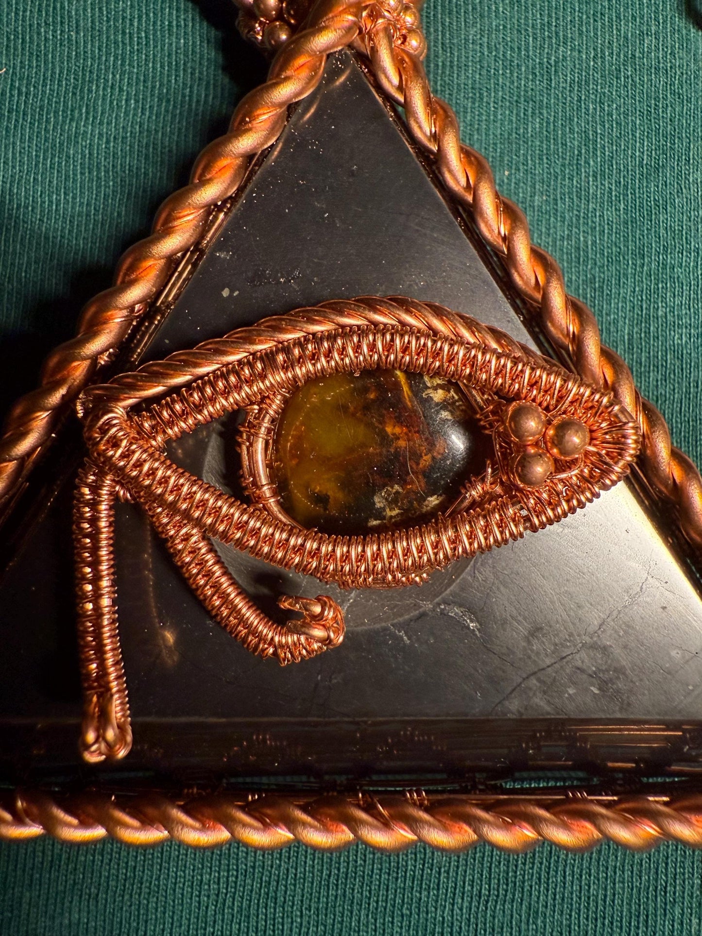 Handmade Copper Wire Wrapped Shungite Pendant with Amber Eye of Horus on Copper Chain